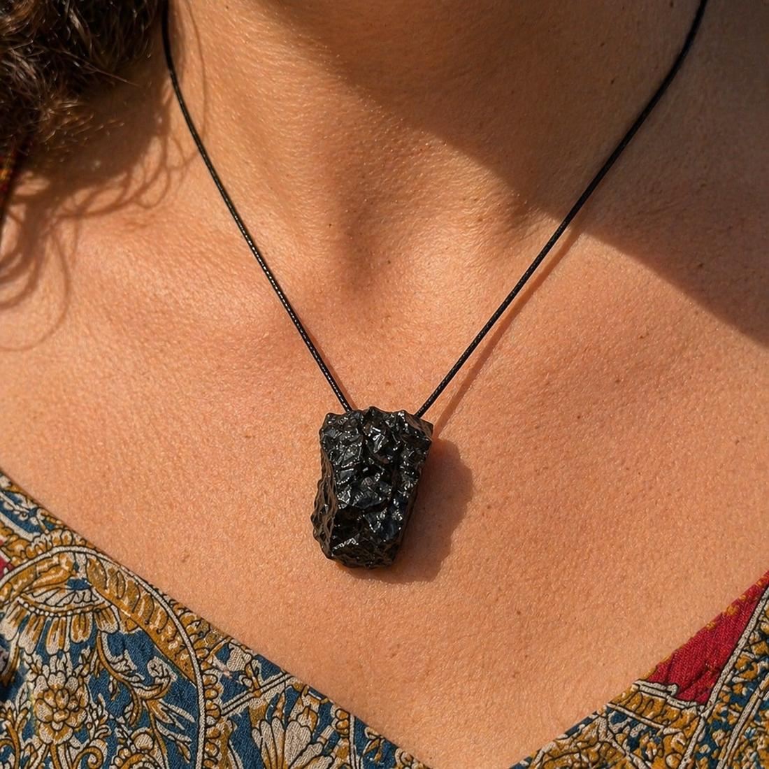 bi chunk of elet shungite worn on neck