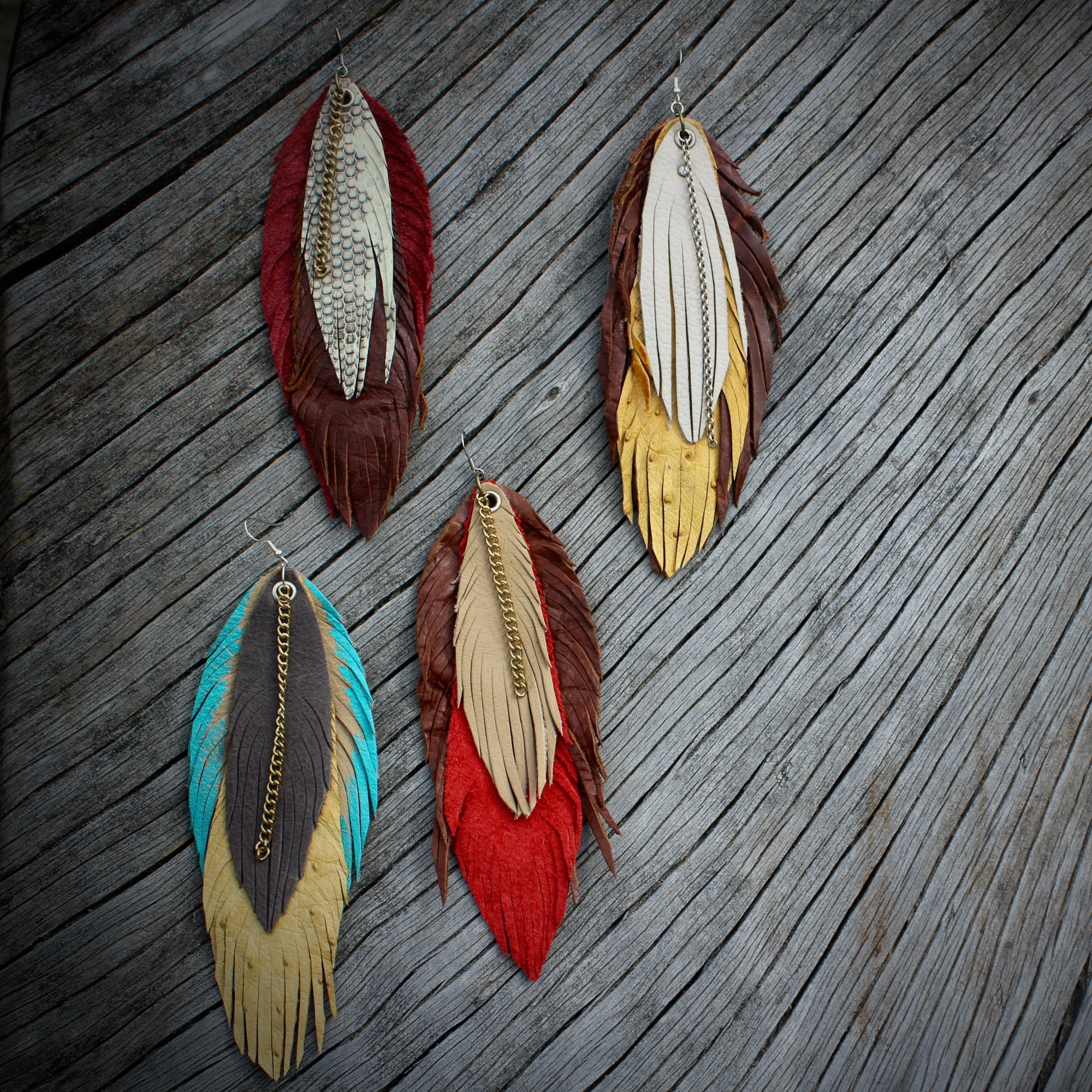 Long leather feather earrings