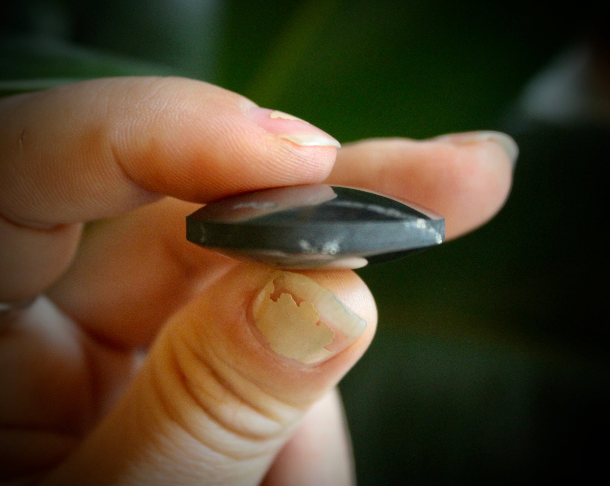 Shungite Sacred Circle Pendant - "Isis" (3cm), displaying unique markings and veins, crafted from genuine shungite stone.