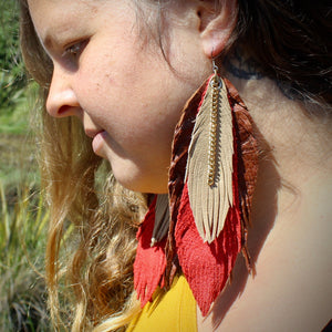 Long leather feather earrings