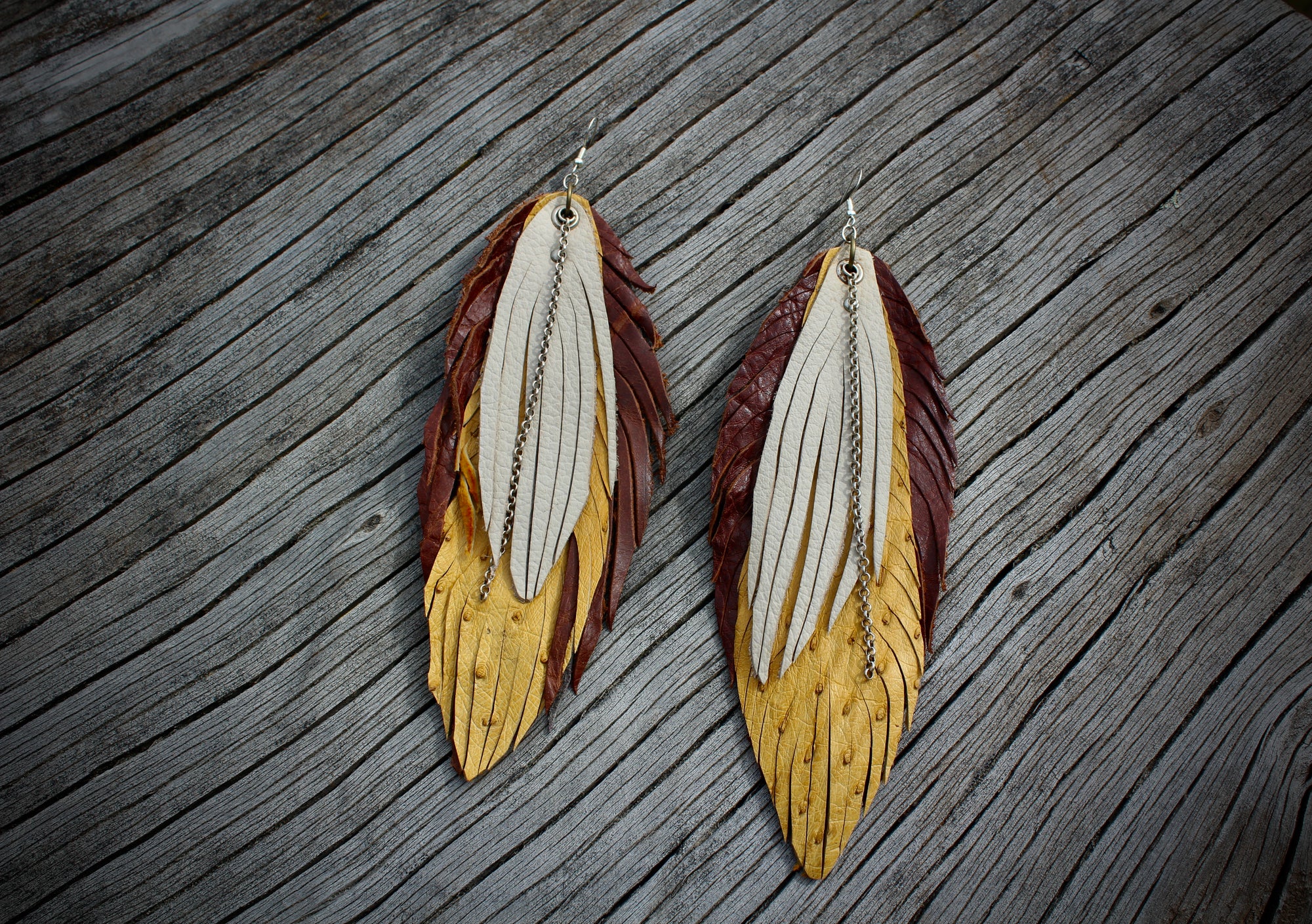 Long leather feather earrings