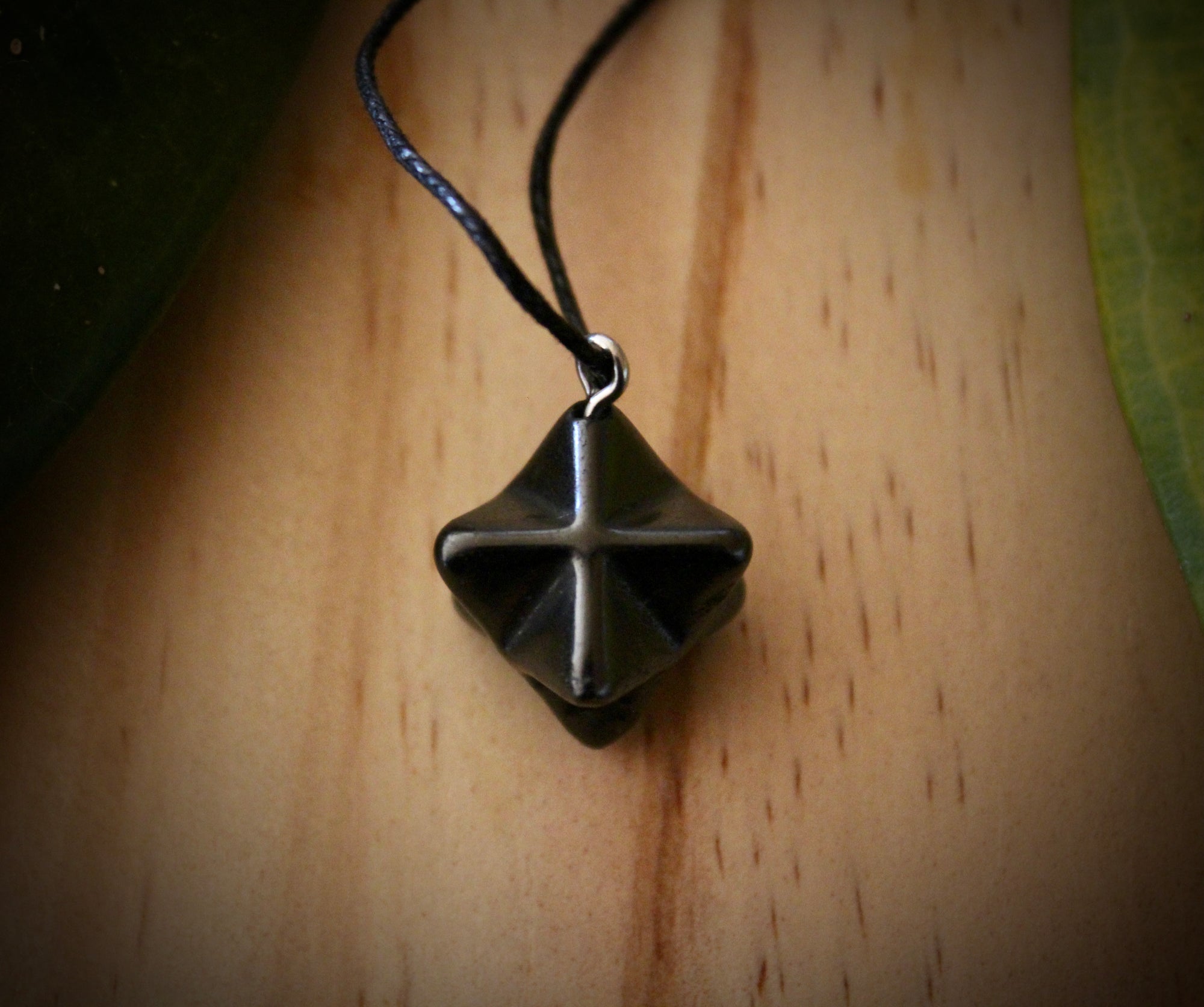 Merkaba Shungite Pendant (1.5cm), handcrafted from genuine shungite stone.