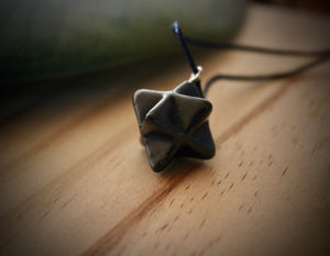 Merkaba Shungite Pendant (1.5cm), handcrafted from genuine shungite stone.